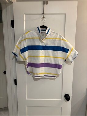 Vintage 80’s cropped shirt with popped collar. HEADLINERS